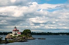 Sun Breaks Through Clouds By Pomham Rocks Lighthouse